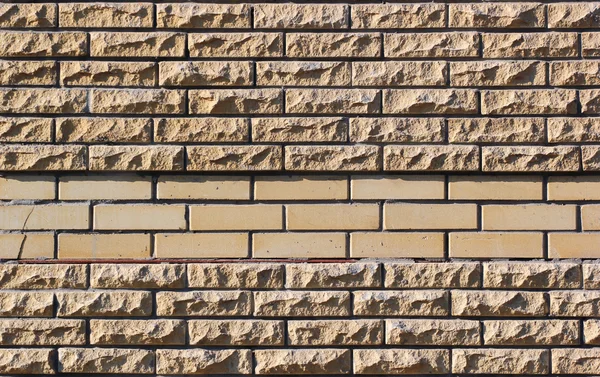 Yellow brick wall fragment — Stock Photo, Image