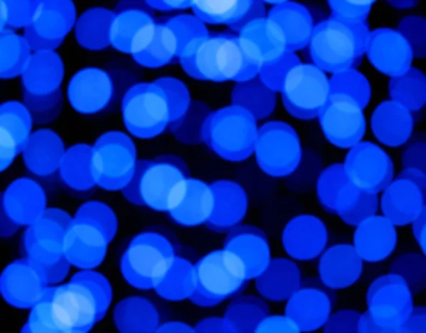 Blue glowing light bokeh blur abstract background — Stock Photo, Image