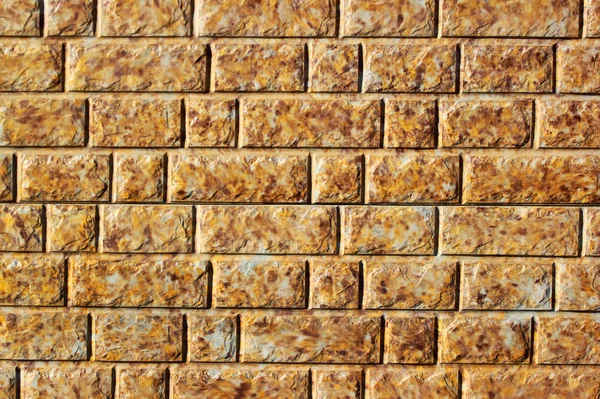 Background of yellow stone slabs wall — Stock Photo, Image