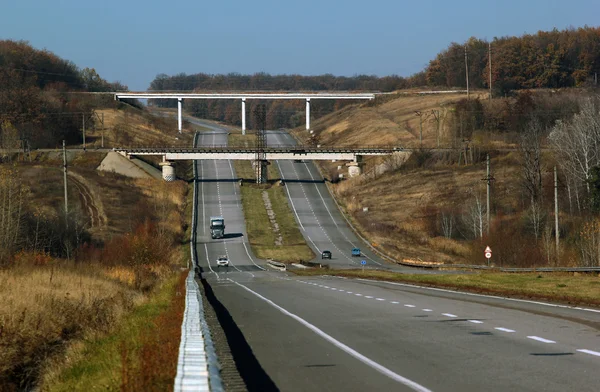 Bridge above the highway, fall landscape — Stock Photo, Image