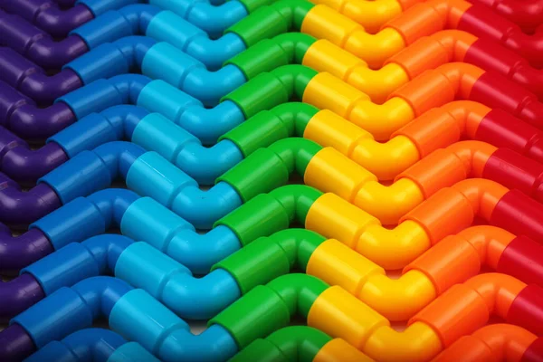Ουράνιο Τόξο Χρώματος Πλαστικούς Σωλήνες Φόντο — Φωτογραφία Αρχείου