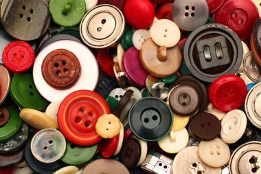 Arkaplan olarak eski plastik dikiş düğmeleri