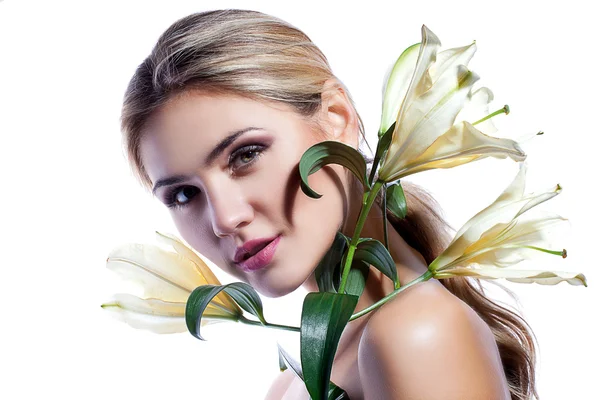 Woman with lily flowers — Stock Photo, Image