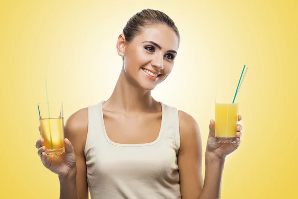 Young woman with juice — Stock Photo, Image