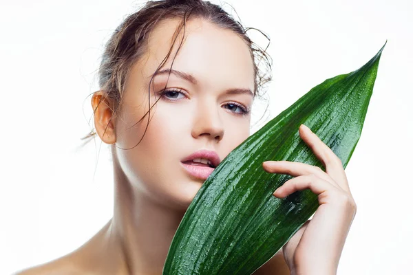 Woman with palm leaf. — Stock Photo, Image