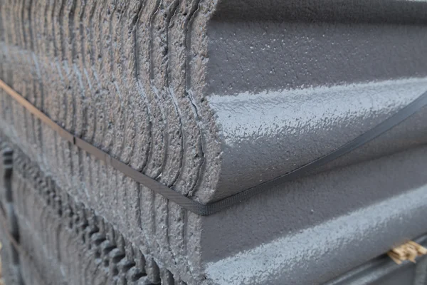 stack of concrete roof tile (gray color) at construction site