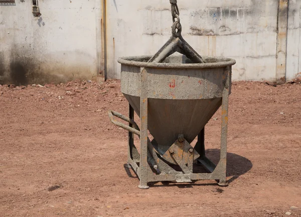 Crane lifting concrete mixer container — Stock Photo, Image