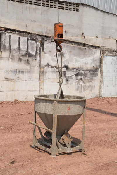 Crane lifting concrete mixer container — Stock Photo, Image