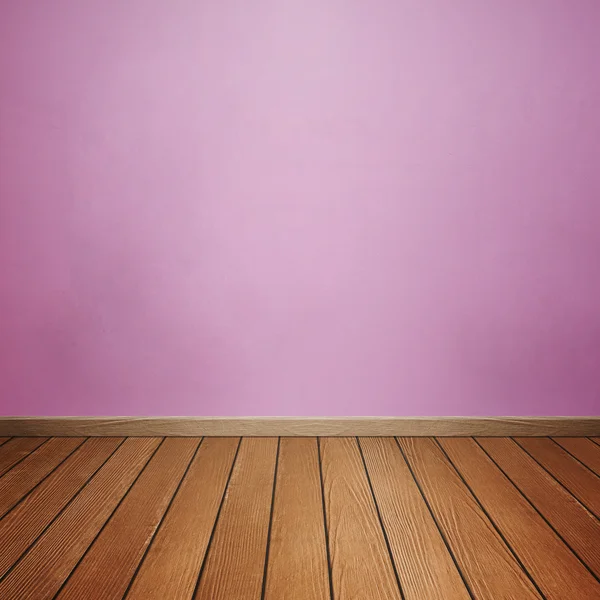 Oda iç beton duvar ve kahverengi ahşap zemin ile