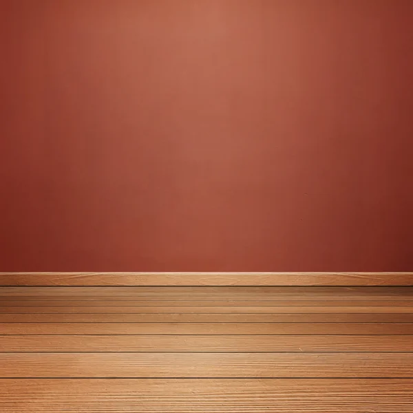 Rum interiör med betongvägg, och bruna trägolv — Stockfoto