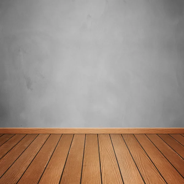 Interior de la habitación con pared de hormigón y suelo de madera marrón — Foto de Stock