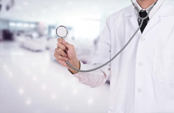 Doctor with stethoscope in hospital — Stock Photo, Image