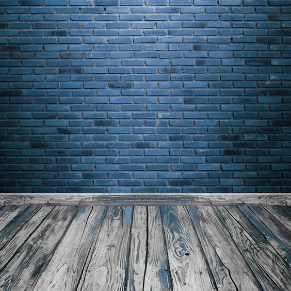 Інтер'єр кімнати з цегляною стіною і дерев'яною підлогою — стокове фото