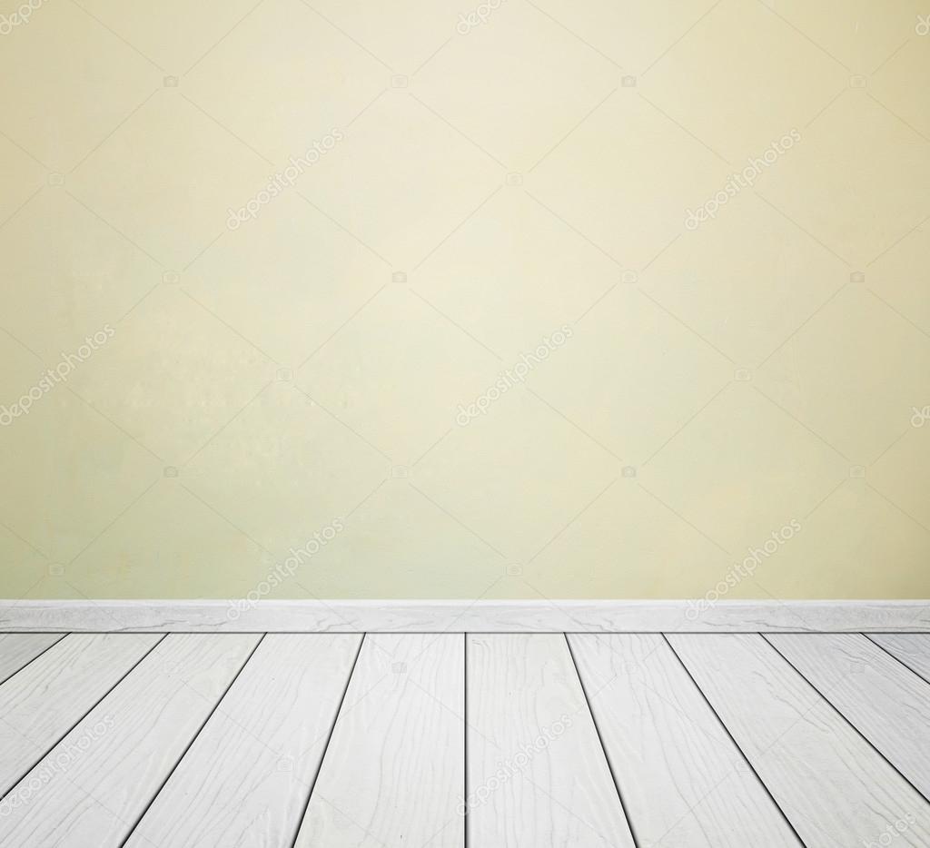 Interiore della stanza con il muro di cemento e pavimento di legno ... Un pavimento di cemento o legno