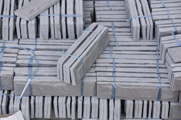 Pile of gray stone tiles prepare for install — Stock Photo, Image