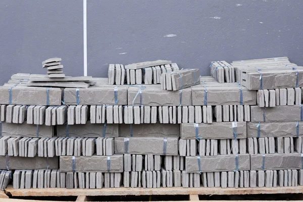 Pile of gray stone tiles prepare for install — Stock Photo, Image