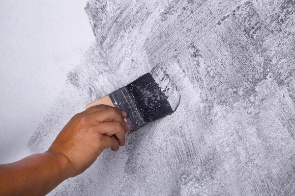 Кисть ручной работы для окраски бетона Лофт стиль на стене — стоковое фото