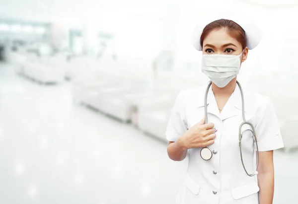 Nurse with stethoscope in hospital — Stock Photo, Image