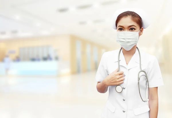 Nurse with stethoscope in hospital — Stock Photo, Image