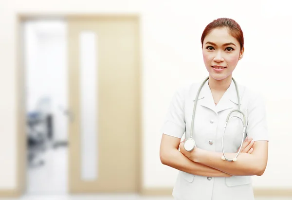 Nurse with stethoscope in hospital — Stock Photo, Image