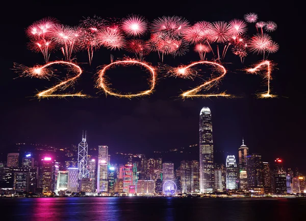 2021 Happy New Year fireworks celebrating over Hong Kong cityscape at night