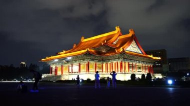 Taipei, Taiwan- 8 June, 2019: Unidentified people visited National Concert Hall of Chiang Kai-Shek Memorial Hall at night in Taipei, Taiwan. the famous landmark with popular travel of tourists visiting Taiwan.