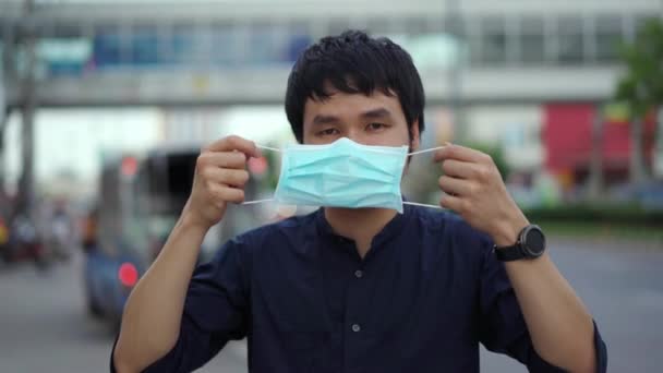 Young Asian Man Wearing Medical Mask Prevention Coronavirus Covid Pandemic — Stock Video