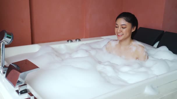 Young Woman Relaxing Takes Bubble Bath Bathtub Foam — Stock Video