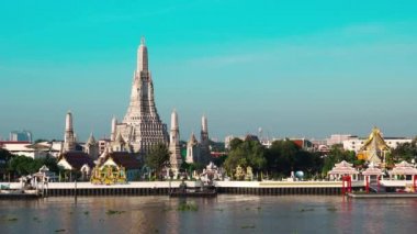 Wat Arun Temple with Chao Phraya river in Bangkok, Thailand