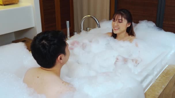 Young Couple Washing Body Foam Bathtub — Stock Video