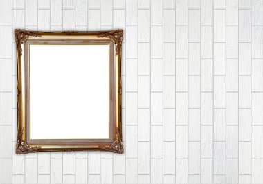 tuğla duvarın üzerinde boş altın çerçeve 