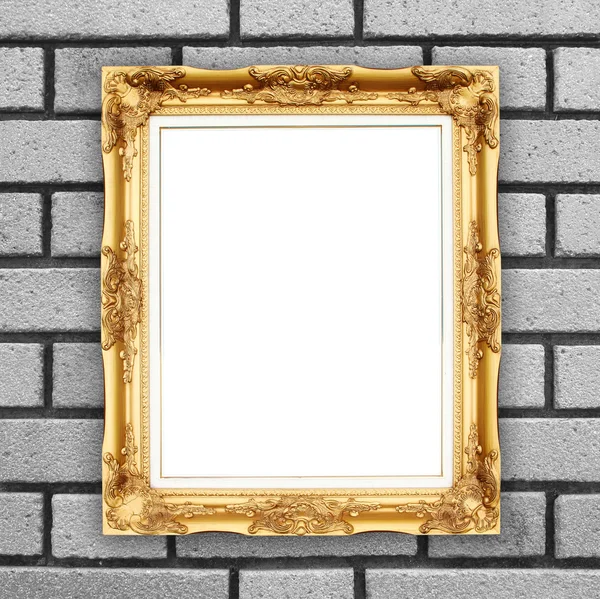 Marco de oro en blanco en la pared de piedra de ladrillo —  Fotos de Stock