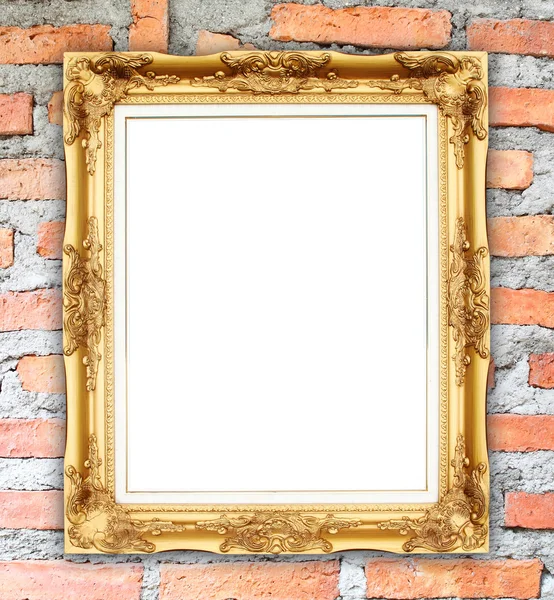 Blank golden frame on brick stone wall — Stock Photo, Image