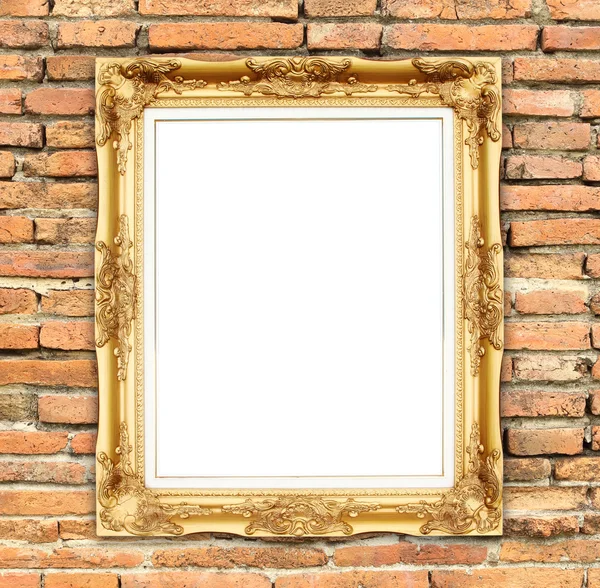 Lege gouden frame op stenen muur — Stockfoto