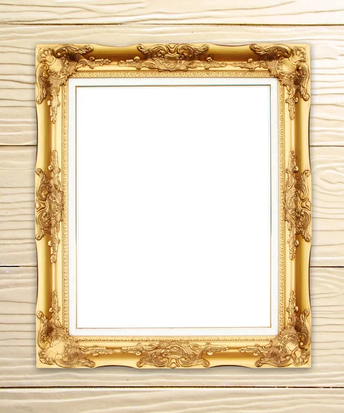 木製の壁で空白のゴールデン フレーム — ストック写真
