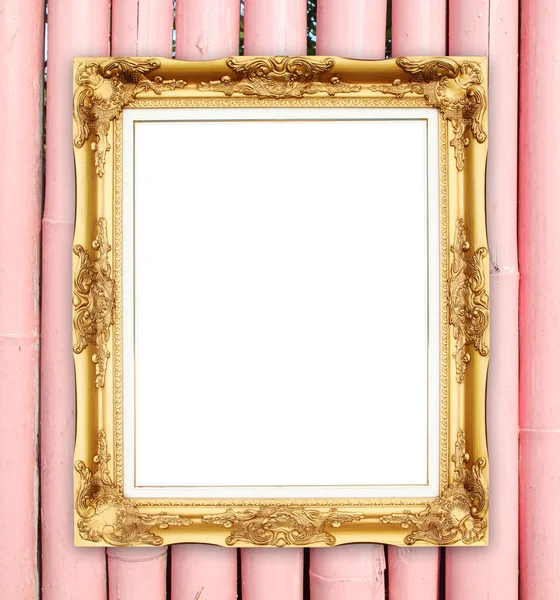Blank golden frame on colorful bamboo wall — Stock Photo, Image