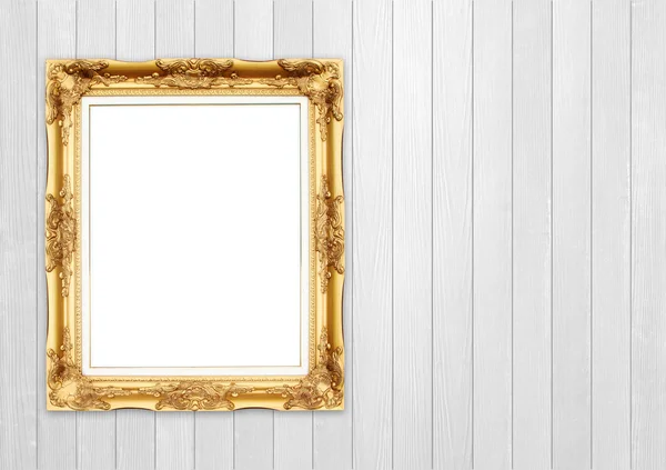 Blank golden frame on wood wall — Stock Photo, Image
