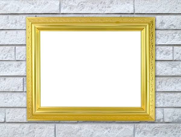 Marco de oro en blanco en la pared de piedra de ladrillo — Foto de Stock