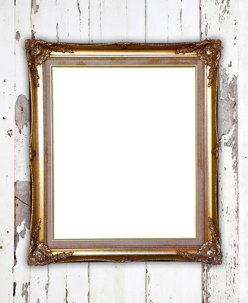 Golden frame on wood wall background — Stock Photo, Image