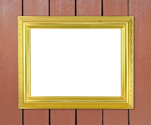 Пустая золотая рамка на деревянной стене — стоковое фото