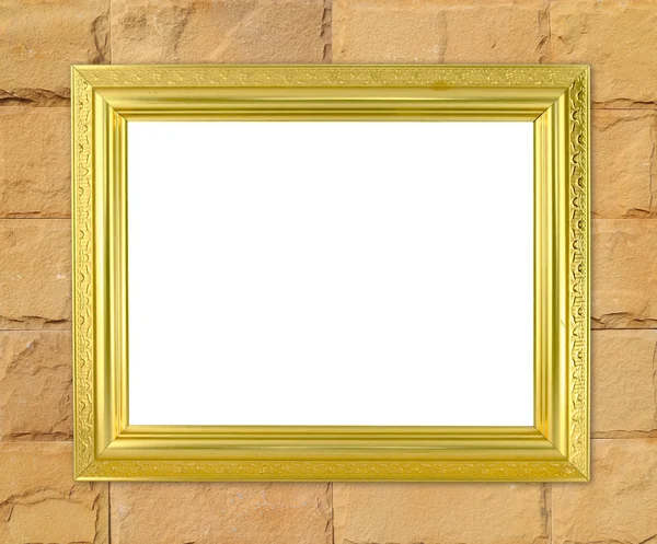 Blank golden frame on brick stone wall background — Stock Photo, Image