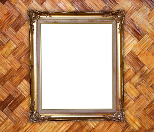 Gouden frame op bamboe textuur achtergrond — Stockfoto