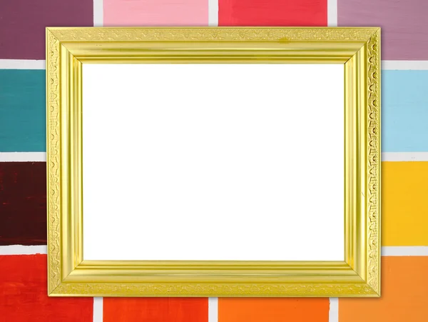 Blank golden frame on wood wall background — Stock Photo, Image