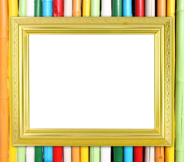 Lege gouden frame op kleurrijke bamboe muur — Stockfoto