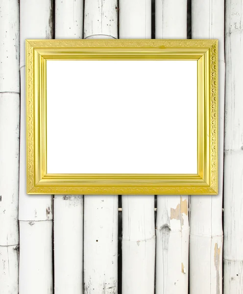 Lege gouden frame op bamboe muur — Stockfoto