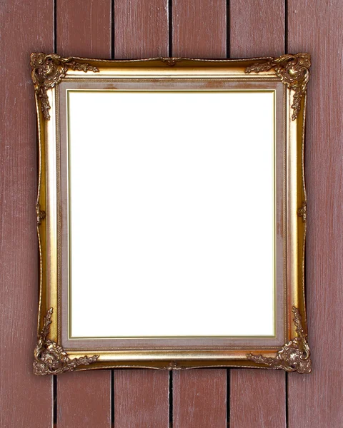 Gouden frame op houten muur — Stockfoto
