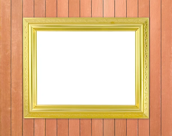 Moldura dourada em branco na parede de madeira — Fotografia de Stock