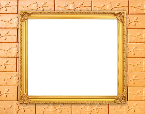 Blank golden frame on brick stone wall — Stock Photo, Image