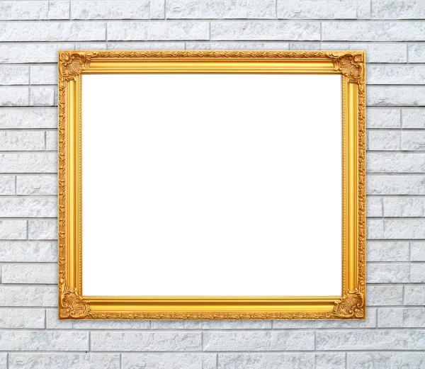 Lege gouden frame op stenen muur — Stockfoto