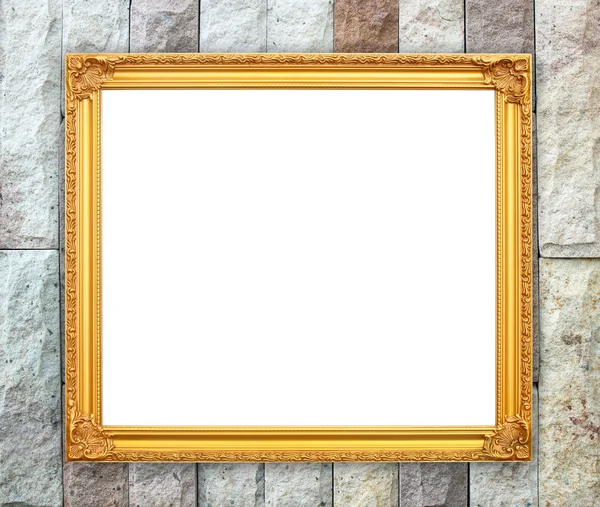 Blank golden frame on brick stone wall — Stock Photo, Image